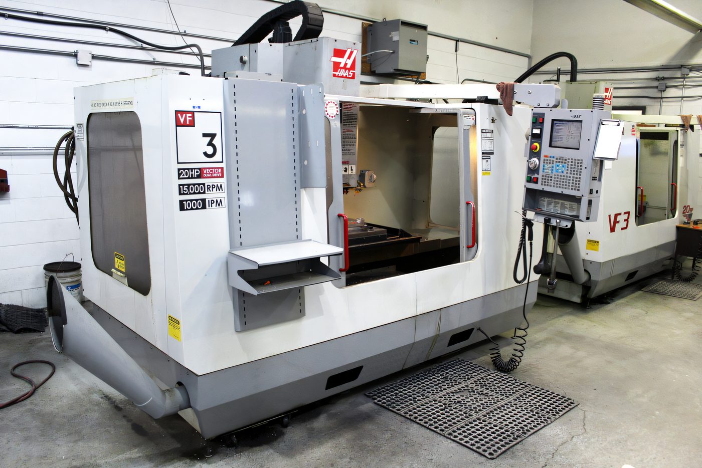 Haas VF-3 CNC machining centre cutting mold components in the Protoplast tool shop