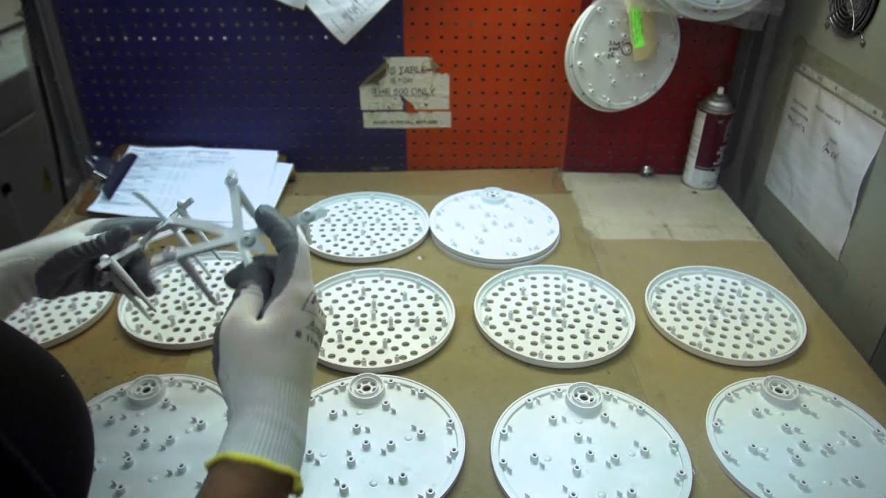 Three-plate shower head mold running at Protoplast, from their own video